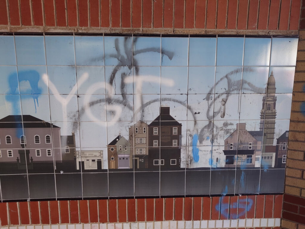 Graffiti removal — before